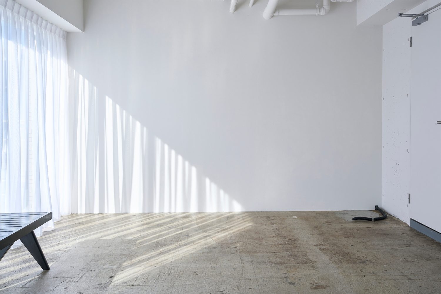 4F 正午過ぎから夕方にかけてのカーテン越しの日差し